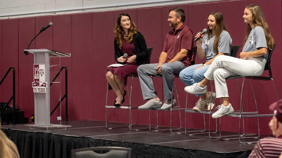 people on stage talking