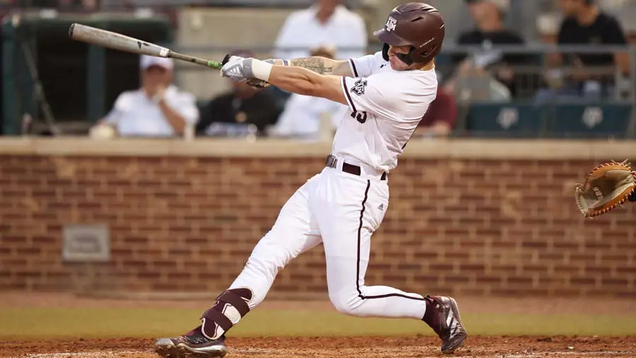 baseball player swinging bat