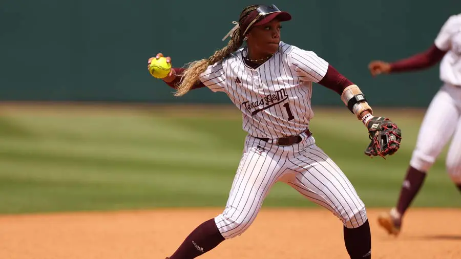softball player throwing ball